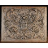 A Relief Carved Renaissance Revival Oak Panel centred by a basket urn cascading fruit and ears of