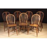 A Harlequin Set of Seven 19th Century Hoop Back Windsor Side Chairs;