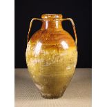 A Large 19th Century Twin-handled Earthenware Amphora with dripped treacle glaze gradiating down