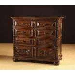 A Late 17th/Early 18th Century Oak Chest of Four Long Cushion Front Drawers with geometric moulding