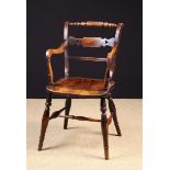 A Regency Period Yew-wood Armchair with elm seat.