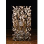 A Fine 17th Century Relief Carved Oak Plaque depicting the haloed figure of Christ draped in