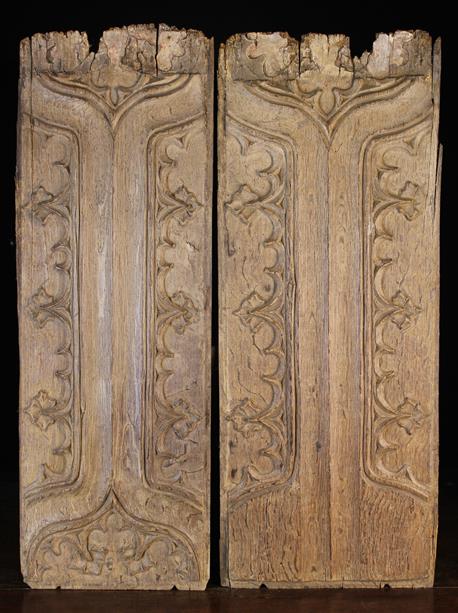 A Similar Pair of Late 15th/Early 16th Century Carved Dry Oak Parchemin Panels embellished with