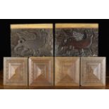 A Pair of 19th Century Panels gouge carved with winged dragons defined against recessed a recessed