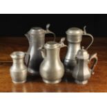 A Group of Five 19th Century Pewter Jugs: Three baluster flagons with hinged lids,
