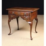 An 18th Century Oak Lowboy.