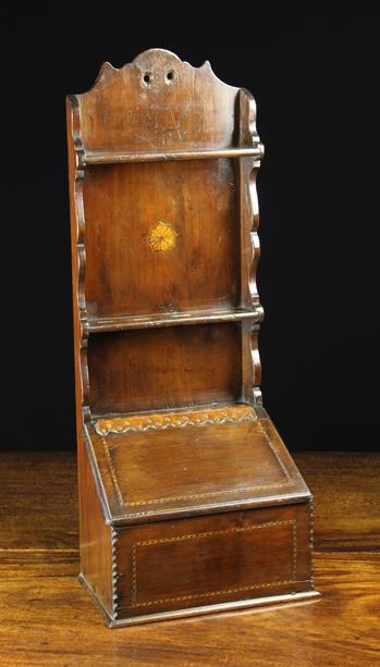 An Early 19th Century Fruitwood Spoon Rack with Candle-box.