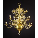 A Large 19th Century Dutch Eighteen Branch Brass Chandelier in the 18th century style.