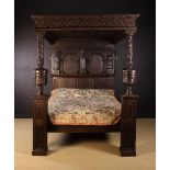 A Fine 17th Century & Later Oak Full Tester Bed enriched with carving.