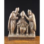 A 16th Century Wood Sculpture carved in relief with Group depicting the Enthronement of a Bishop,