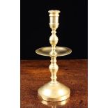 A Brass Heemskerk Candlestick.