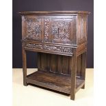 A Carved Oak French Renaissance Stye Dressoir incorporating a pair of 16th Century cupboard doors
