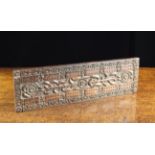 A Fine 19th Century Carved Ebony Cribbage Board decorated with flowers and foliage defined against