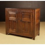 A 17th Century Joined Oak Cupboard.