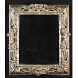 A Charles II Silver Gilt Wall Mirror.