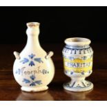A Faience Guglet of flattened pear-shaped form with loop handles to the shoulders,