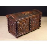 An Unusual 17th Century Carved & Painted Dome-topped Trunk.