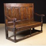 A Small Early 18th Century Joined Oak Settle of good colour & patination.