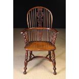 A Fine 19th Century Yew-wood High Decorative Splat Windsor Armchair attributed to Worksop.