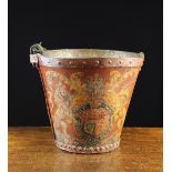 A Georgian Leather Fire Bucket painted with Royal Crest on a red ground and having riveted foot and