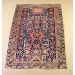 An Early 20th Century Caucasian Carpet, 55" x 78¾" (140 cm x 200 cm).