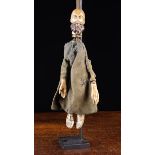 An Unusual 19th Century Puppet Bag, with carved & polychromed head, hands and feet.