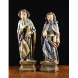 A Pair of 16th Century Polychrome Relief Carvings of Saint John depicted holding a chalice,