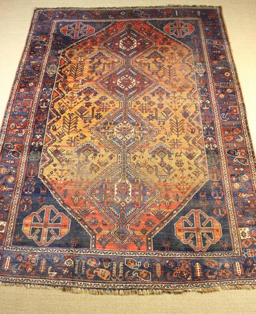 An Old Carpet 125" x 88" (318 cm x 224 cm).