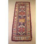 A Late 19th Century Kazak Karachov Carpet Runner 40" x 110" (102 cm x 280 cm).