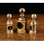 Three 19th Century Turned Lignum Vitae Nut Crackers with screw thread crackers surmounted by ball