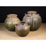 Three Large Early 19th Century French Green-glazed Terracotta Storage Vessels of globular form and