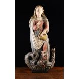 A 16th/17th Century Polychromed Wood Relief Carving of a Saint Margaret of Antioch and Dragon.