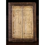 A Fine Pair of Carved Bone Casket Panels depicting Saints with haloes;