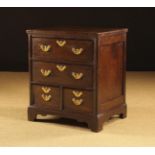 A Small 18th Century Provincial Oak Chest of Drawers housing two long over a pair of short drawers