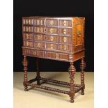 A 17th Century Portuguese Collector's Cabinet on Stand.