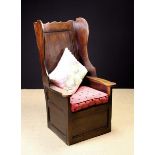 An 18th Century Joined Oak Lambing Chair.