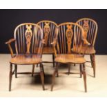 A Pair of Low Hoop-back Windsor Armchairs and a Pair of matching Side Chairs,