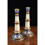 A Pair of 19th Doulton Lambeth Stoneware Candlesticks dated 1880,