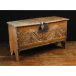 A 17th Century Child's Boarded Oak Coffer (A/F).