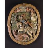 A 16th Century Relief Carved & Polychromed Oval Plaque depicting Saint George on horseback slaying