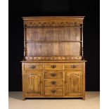 A 20th Century Oak 'Welsh' Dresser with Rack.