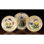 Three Large 18th Century Delft Polychrome Plates, 13¾" (35 cm), 12¼" (31 cm) and 12" (30.