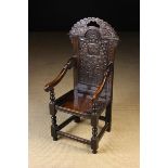 A Fine 17th Century Style Child's Wainscot Derbyshire Armchair carved with the Cavendish family