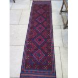 A hand knotted woollen Meshwani runner - 240cm x 64cm