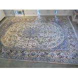 A hand knotted woollen Fine Nain rug - 388cm x 291cm