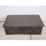 An 18th Century and later oak bible box, with a carved front, good colour and patina - 18cm H x 61cm