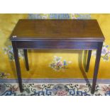 A 19th Century mahogany fold over side/tea table - 86cm W x 72cm H x 43cm D