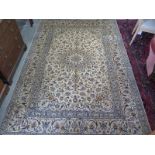 A hand knotted, woollen Kashan rug, 300cm x 200cm, in good condition