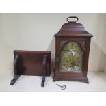 A mahogany twin fusee bracket clock with an arched dial with strike silent and calendar, striking on