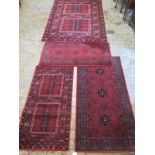 Four machine made rugs, largest 198cm x 140cm